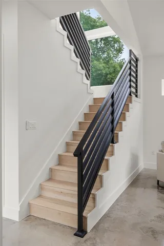 a bathroom with a sink mirror and vanity
