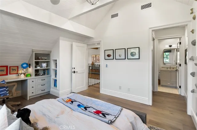 a bedroom with a bed and furniture