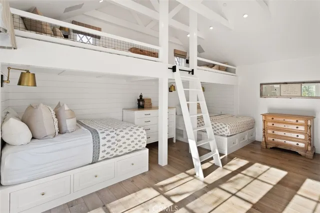 a bedroom with furniture and a window