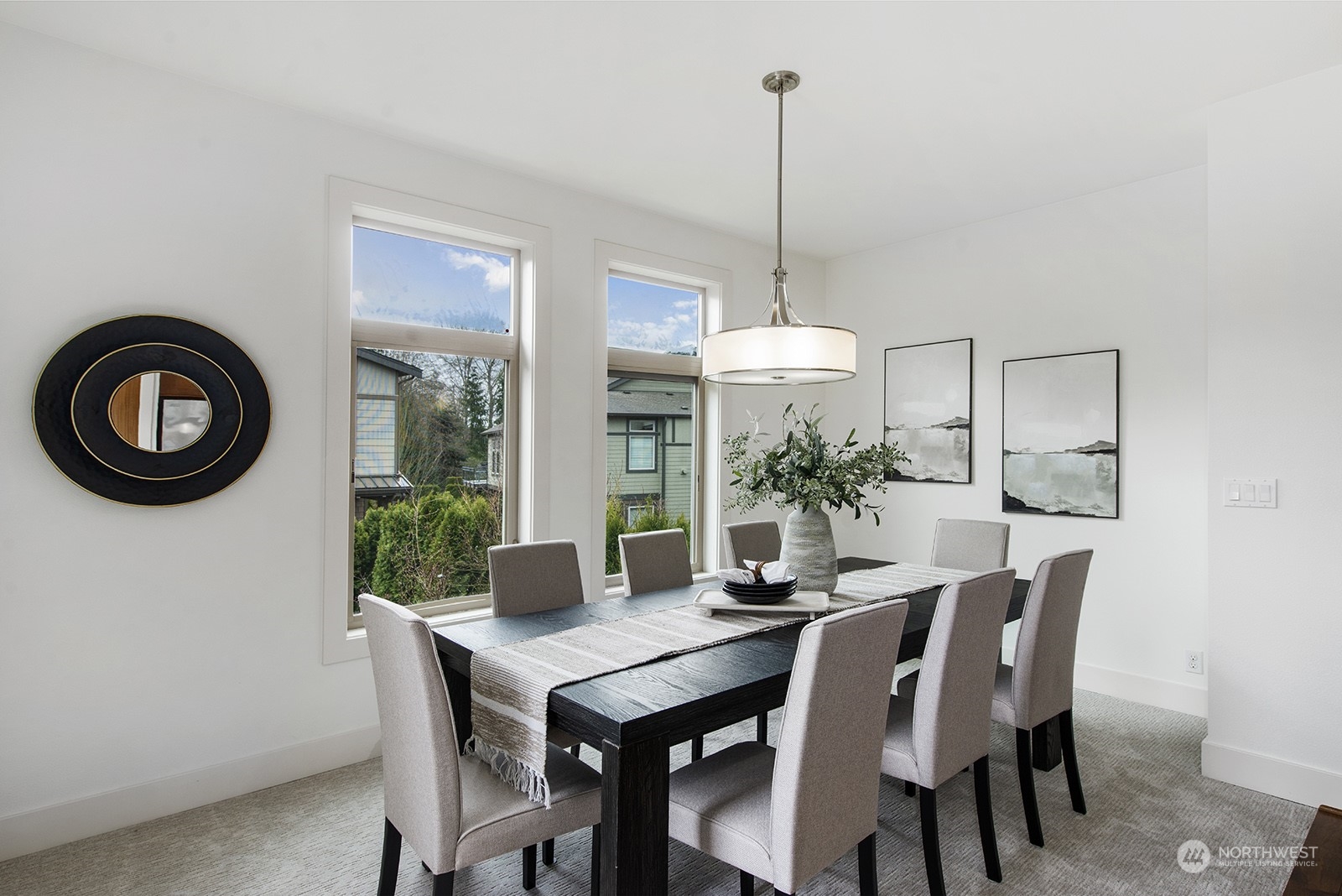 1229 North 42nd Place Renton, WA 98056 - Photo 13 of 40 a view of a dining room with furniture window and outside view
