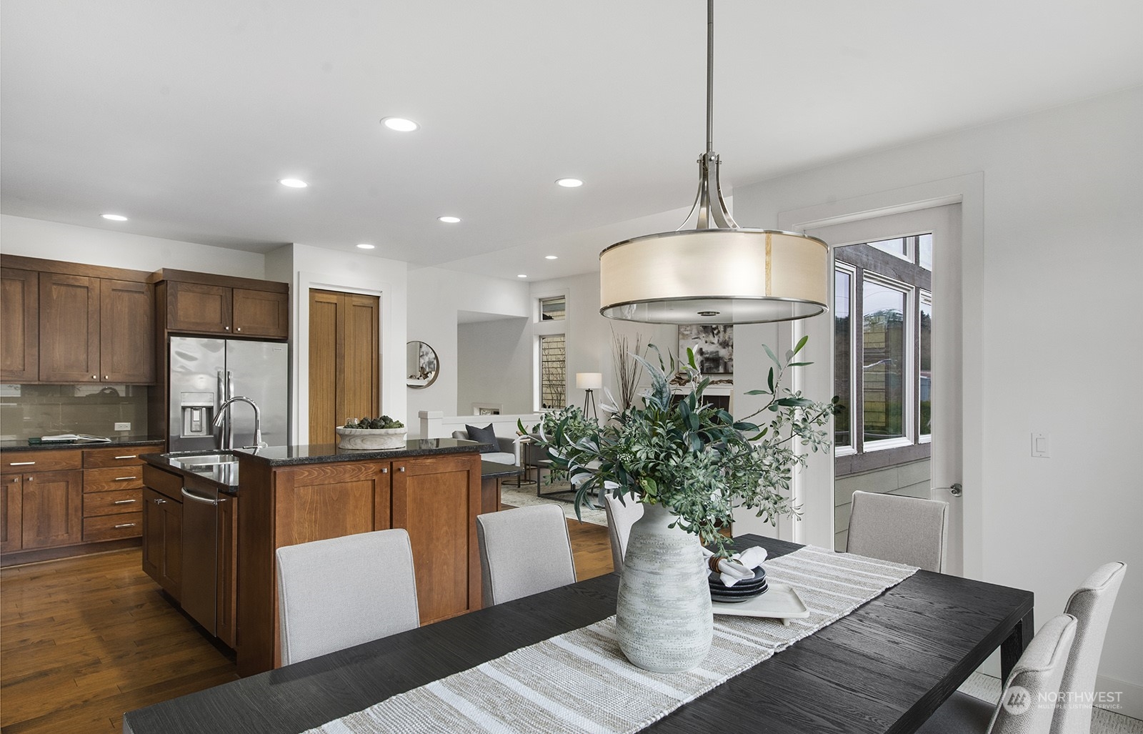 1229 North 42nd Place Renton, WA 98056 - Photo 14 of 40 a dining room with furniture potted plants