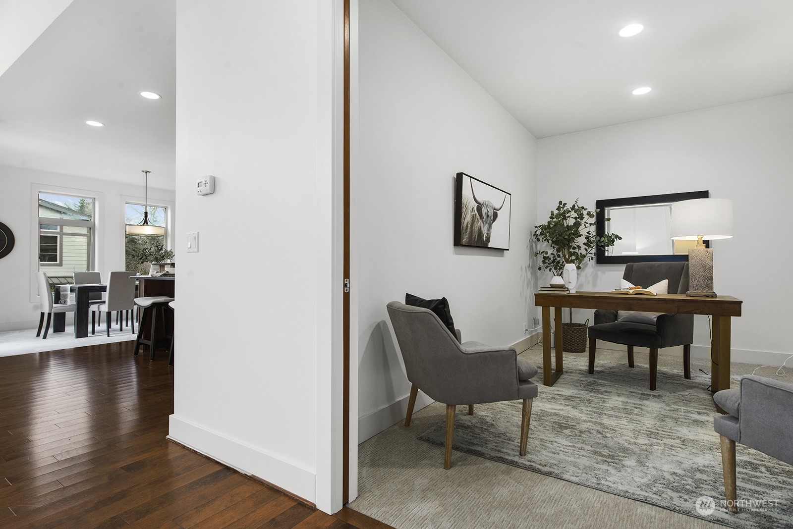 1229 North 42nd Place Renton, WA 98056 - Photo 20 of 40 a workspace with furniture and wooden floor
