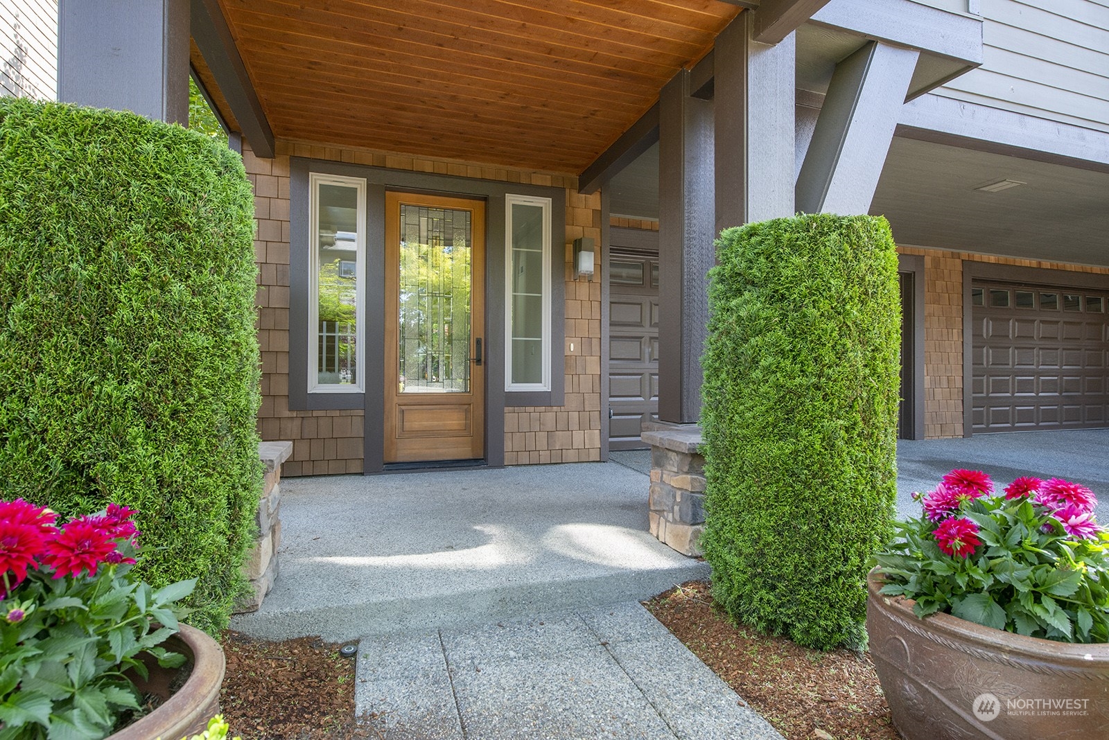 1229 North 42nd Place Renton, WA 98056 - Photo 2 of 40 a view of a house with potted plants