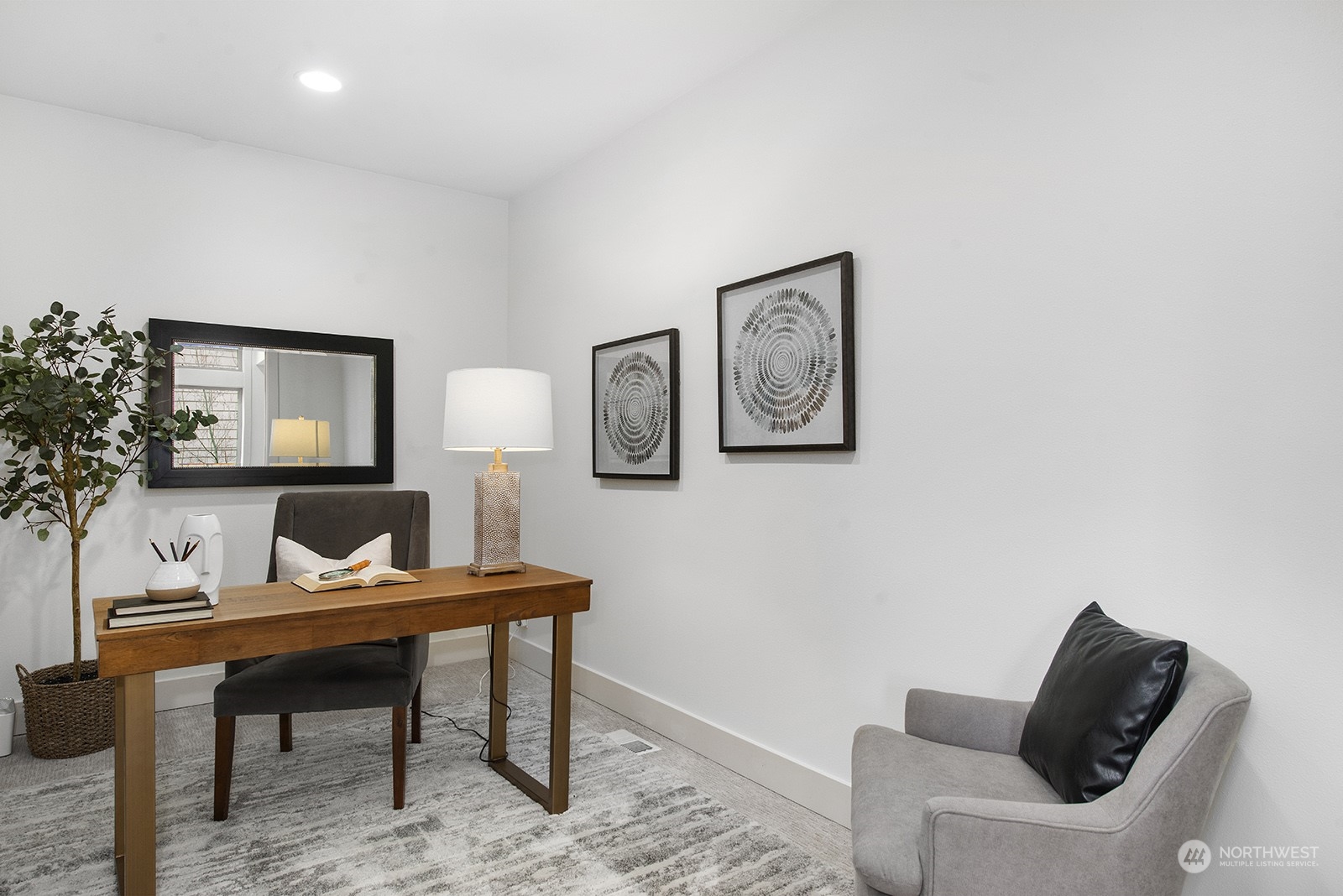 1229 North 42nd Place Renton, WA 98056 - Photo 21 of 40 a view of a workspace with furniture