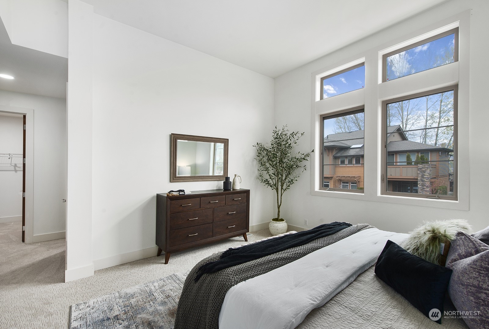 1229 North 42nd Place Renton, WA 98056 - Photo 23 of 40 a bedroom with a bed and window