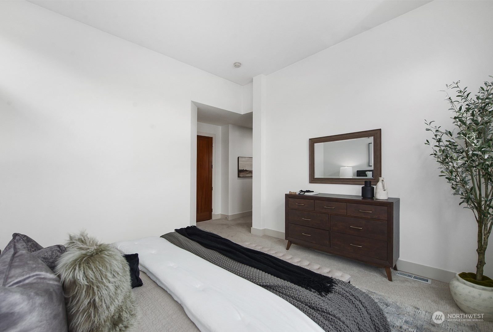 1229 North 42nd Place Renton, WA 98056 - Photo 24 of 40 a bedroom with a bed and a dresser