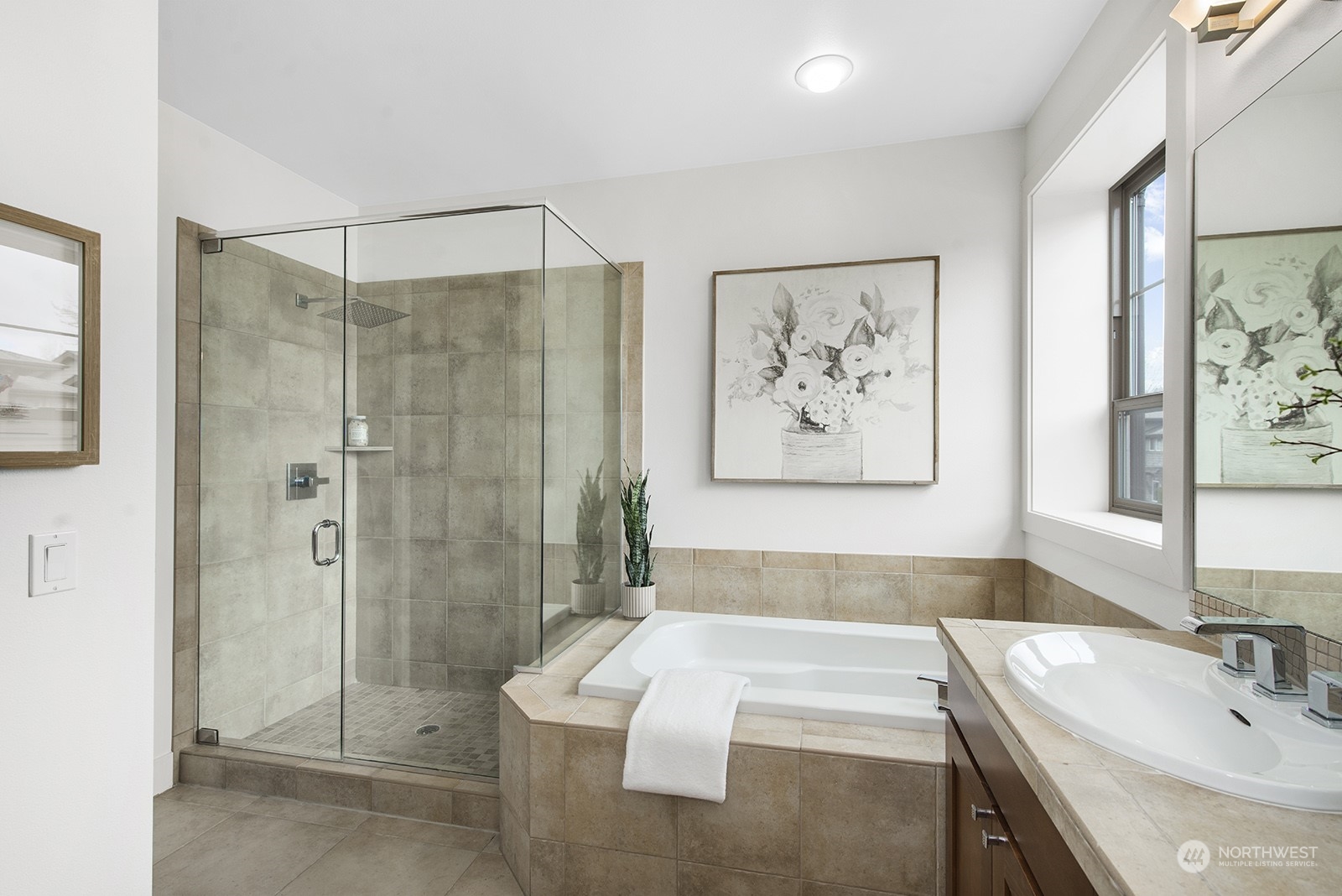 1229 North 42nd Place Renton, WA 98056 - Photo 26 of 40 a bathroom with a tub shower sink and mirror