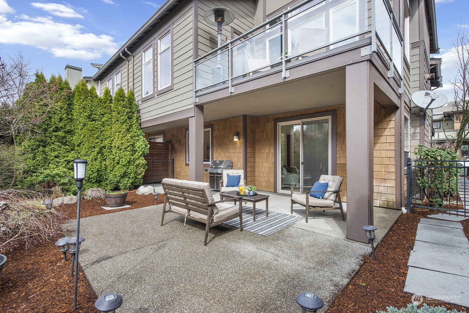 1229 North 42nd Place Renton, WA 98056 - Photo 35 of 40 a view of a patio with couches and potted plants