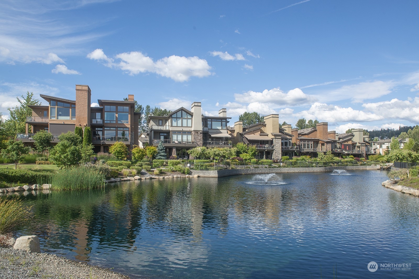 1229 North 42nd Place Renton, WA 98056 - Photo 36 of 40 a view of a lake with a city