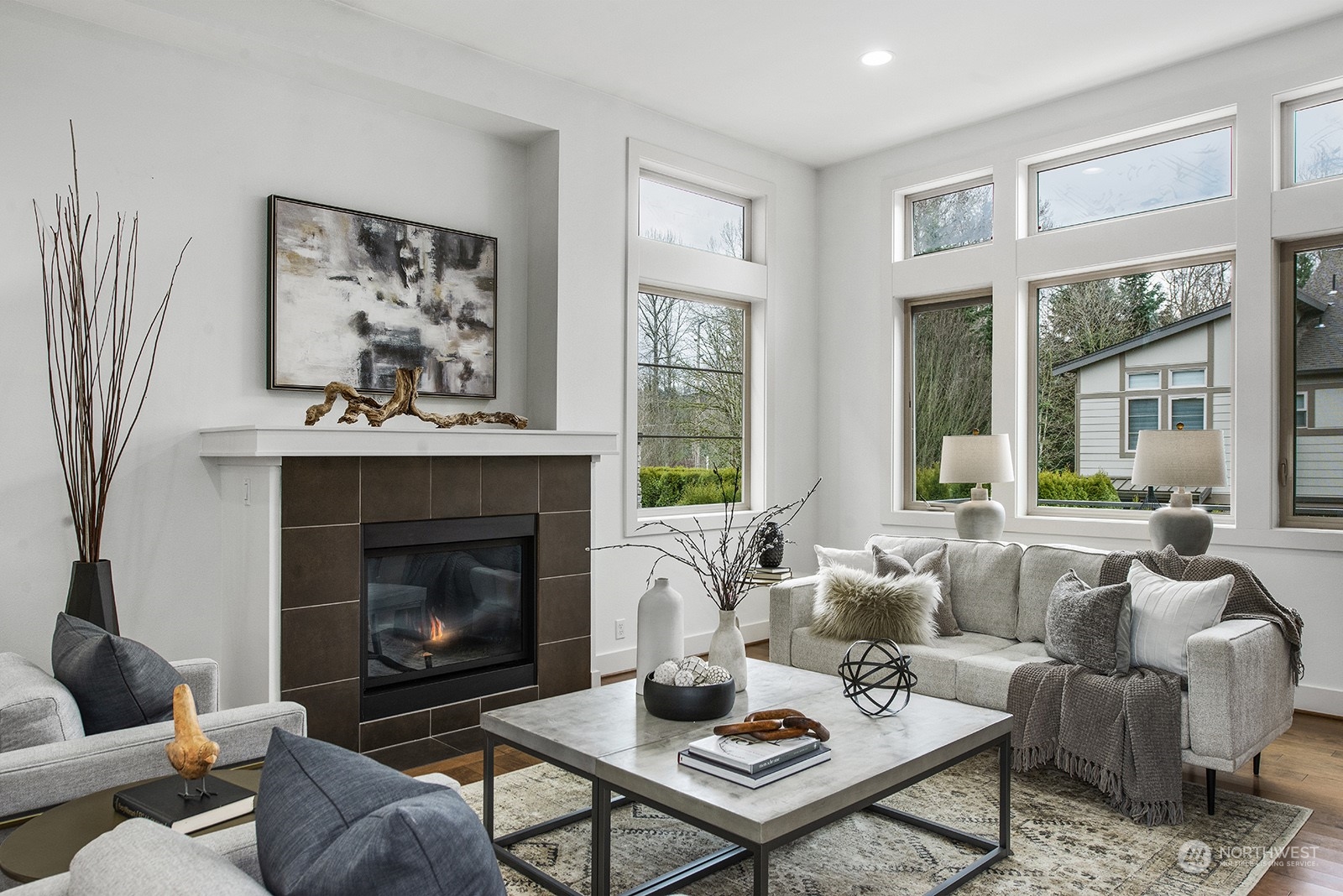 1229 North 42nd Place Renton, WA 98056 - Photo 7 of 40 a living room with furniture and a fireplace