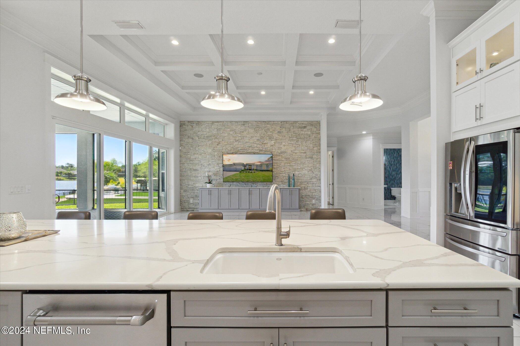 522 Old Bluff Drive Ponte Vedra, FL 32081 - Photo 24 of 93 a bathroom with a sink a large mirror and vanity