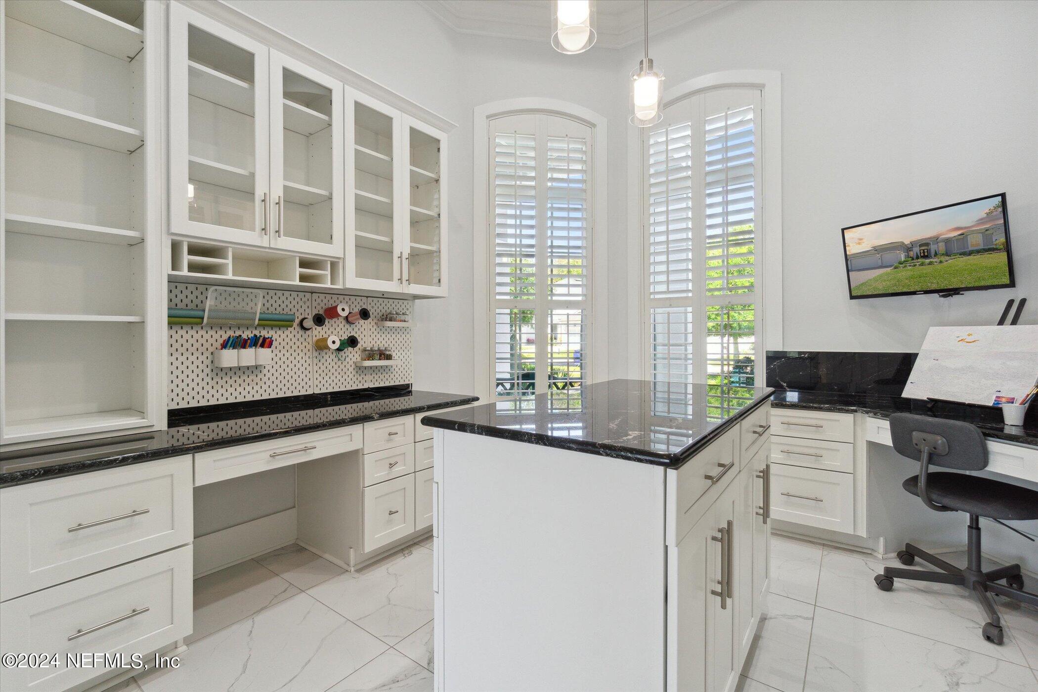522 Old Bluff Drive Ponte Vedra, FL 32081 - Photo 28 of 93 a kitchen with stainless steel appliances cabinets and window