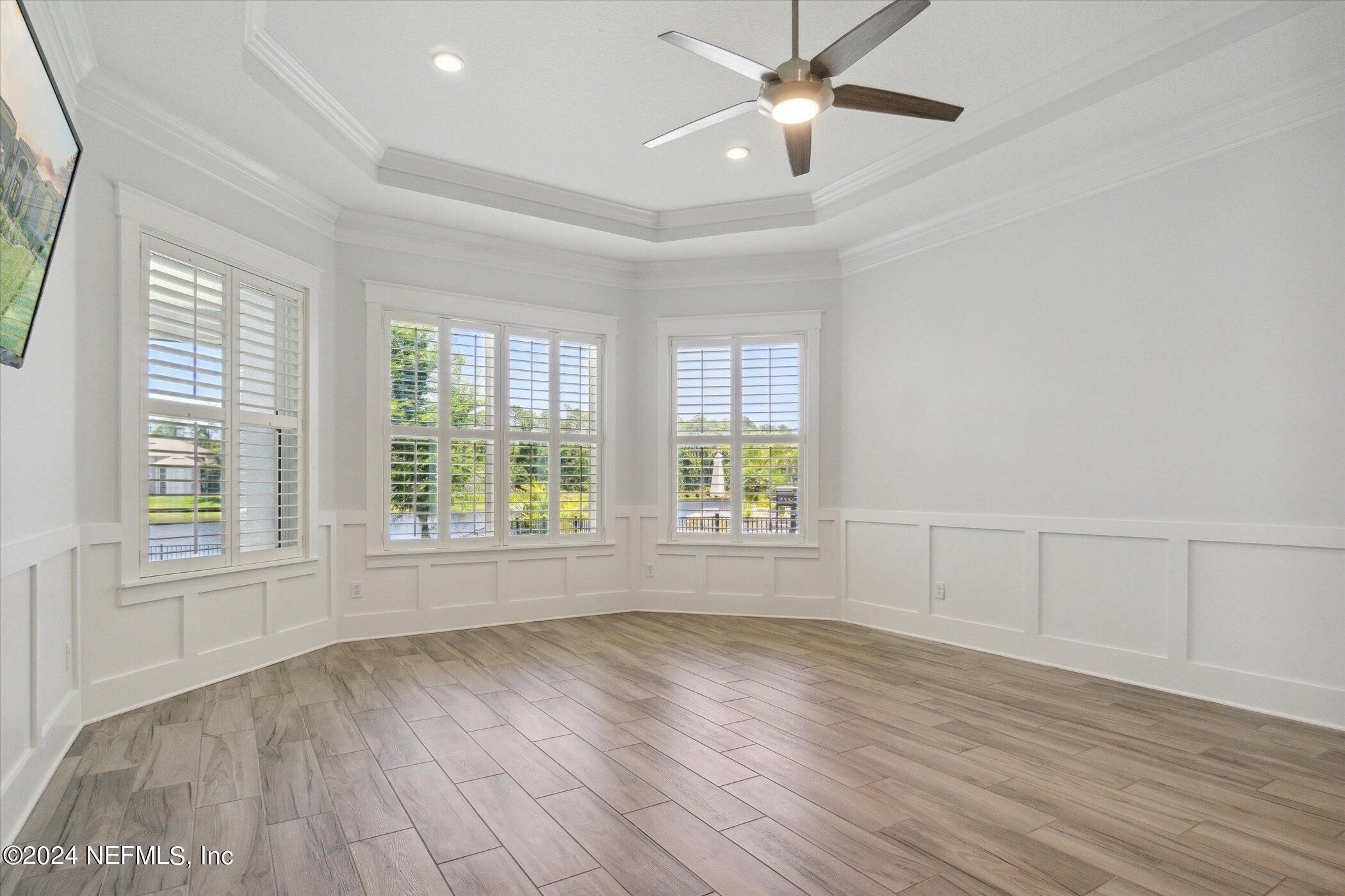 522 Old Bluff Drive Ponte Vedra, FL 32081 - Photo 30 of 93 a view of an empty room with wooden floor and a window