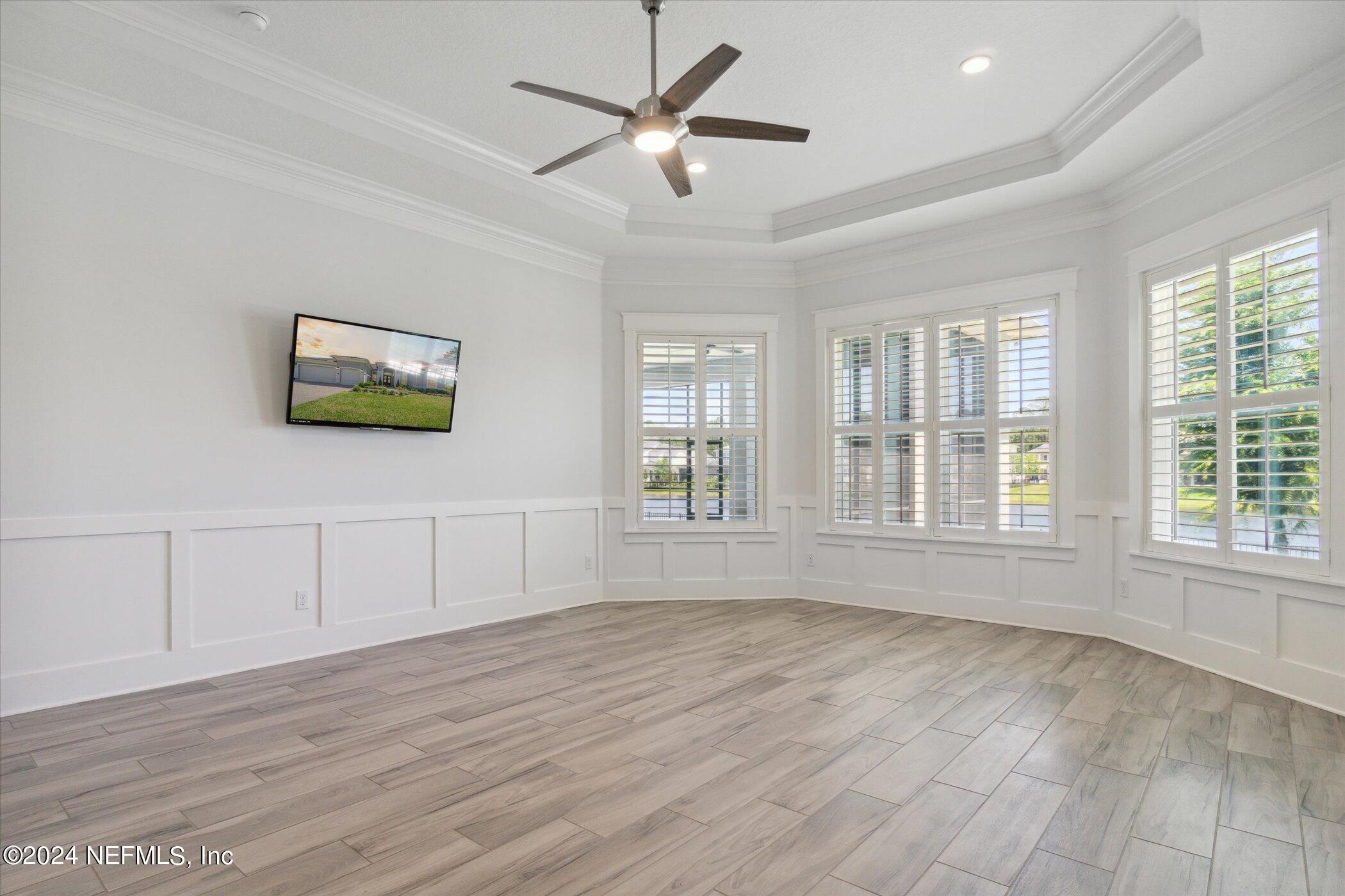 522 Old Bluff Drive Ponte Vedra, FL 32081 - Photo 31 of 93 a view of empty room with wooden floor and fan