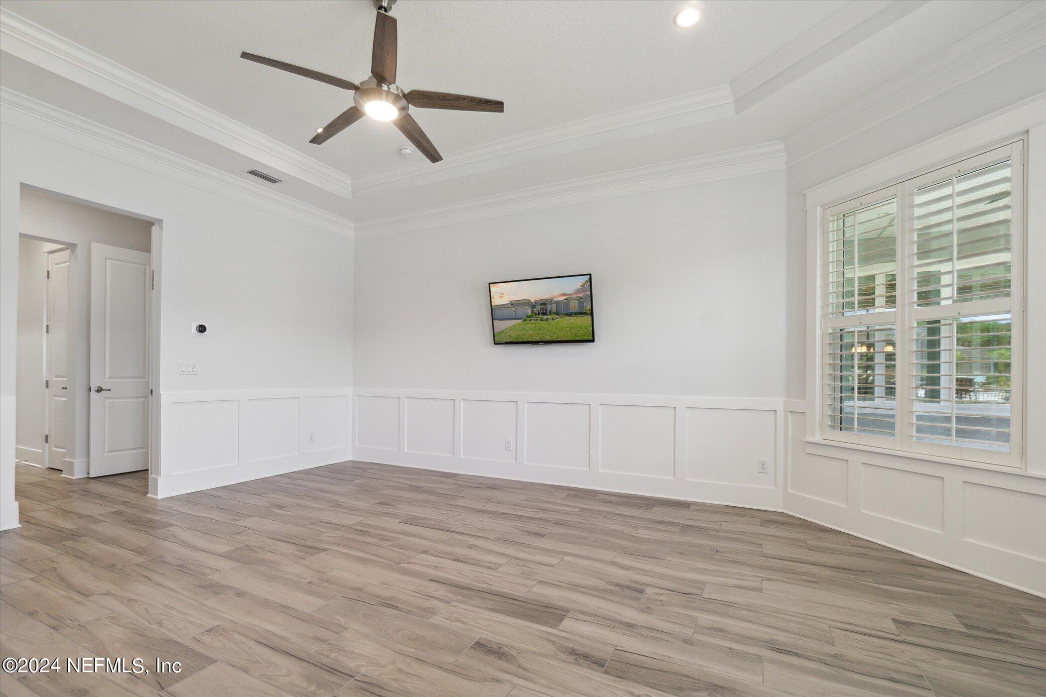 522 Old Bluff Drive Ponte Vedra, FL 32081 - Photo 32 of 93 a view of empty room with wooden floor and fan