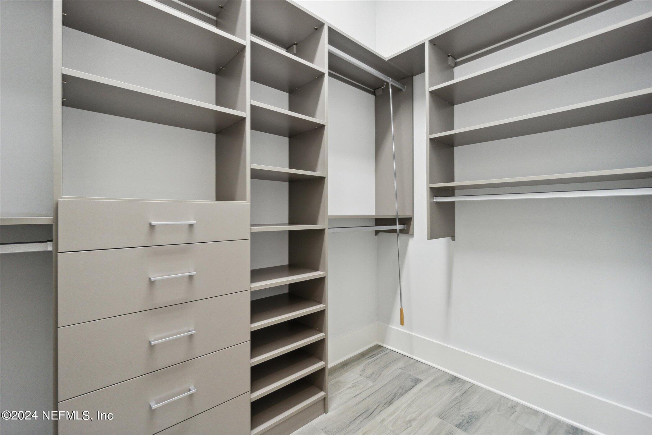 522 Old Bluff Drive Ponte Vedra, FL 32081 - Photo 43 of 93 a view of walk in closet with empty racks