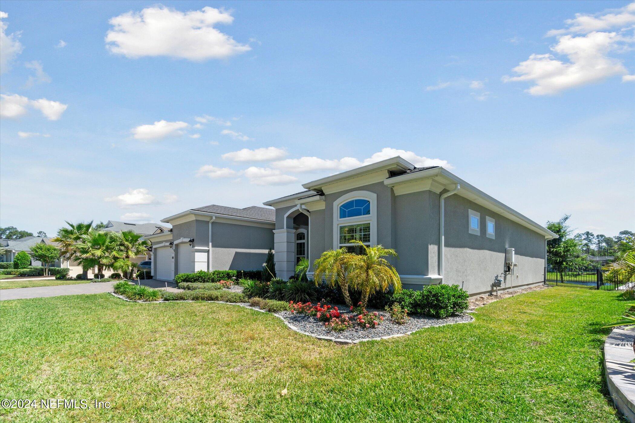 522 Old Bluff Drive Ponte Vedra, FL 32081 - Photo 6 of 93 a front view of house with yard and green space