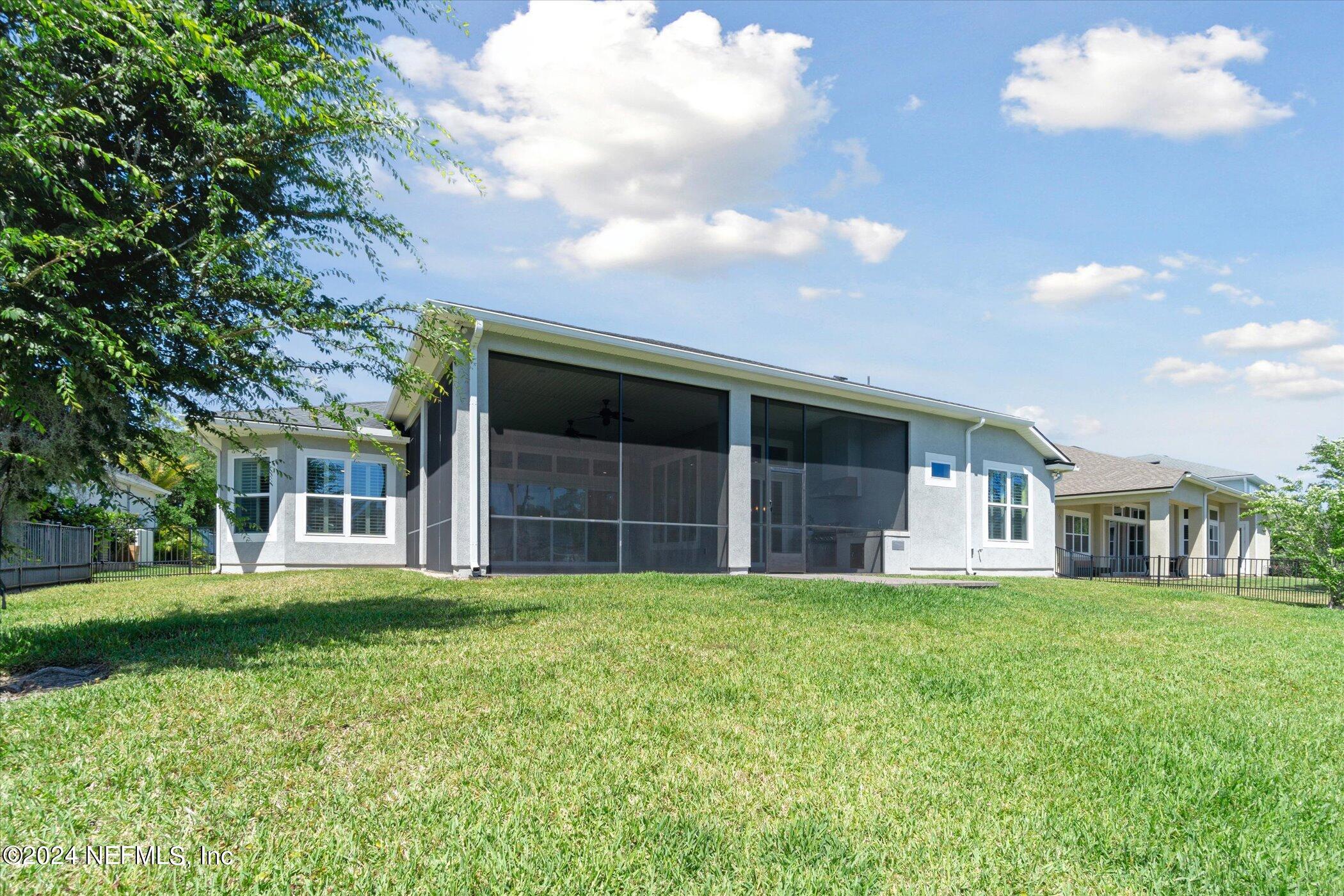 522 Old Bluff Drive Ponte Vedra, FL 32081 - Photo 65 of 93 a big house with a big yard and large trees