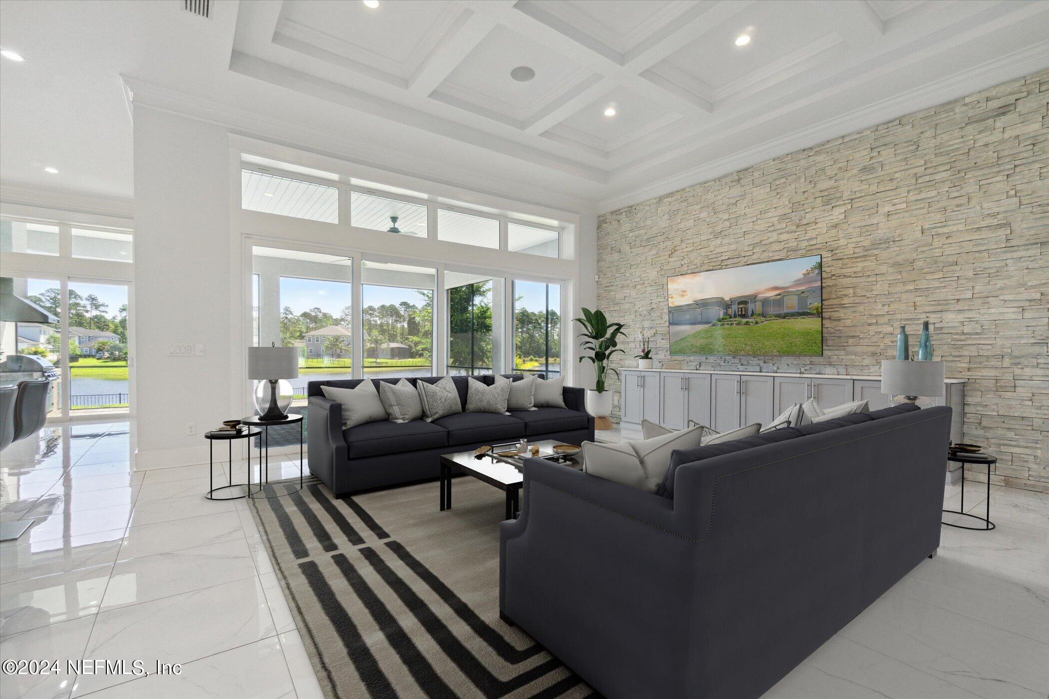 522 Old Bluff Drive Ponte Vedra, FL 32081 - Photo 10 of 93 a living room with furniture and a flat screen tv