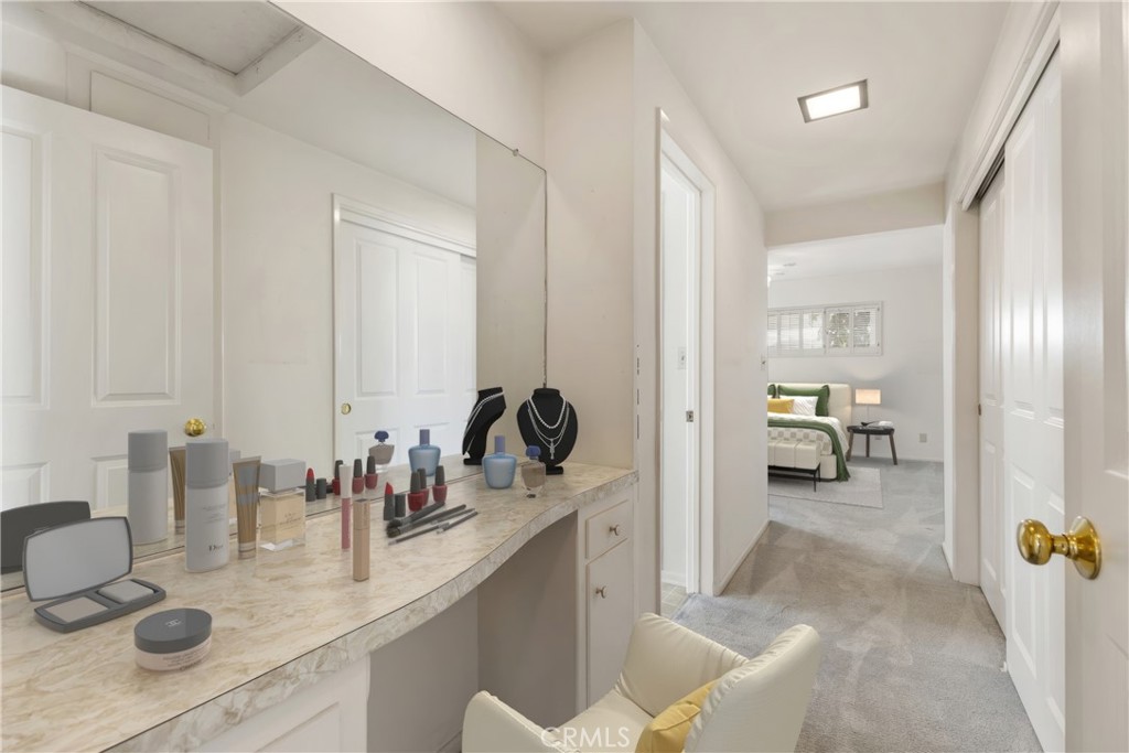 707 Luring Drive Glendale, CA 91206 - Photo 12 of 25 a en suite bathroom with a granite countertop sink and a mirror
