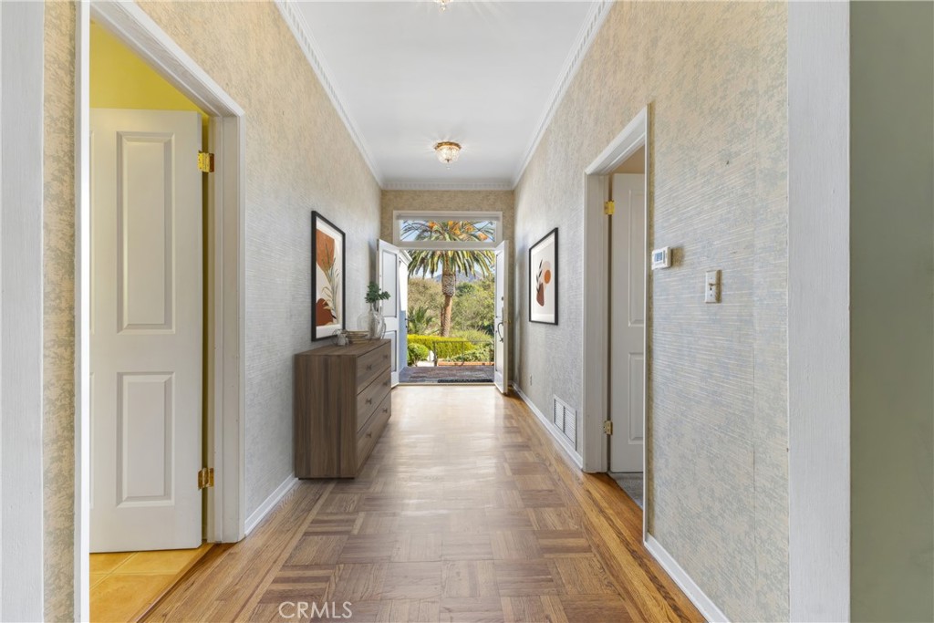 707 Luring Drive Glendale, CA 91206 - Photo 6 of 25 a view of a hallway with wooden shelves