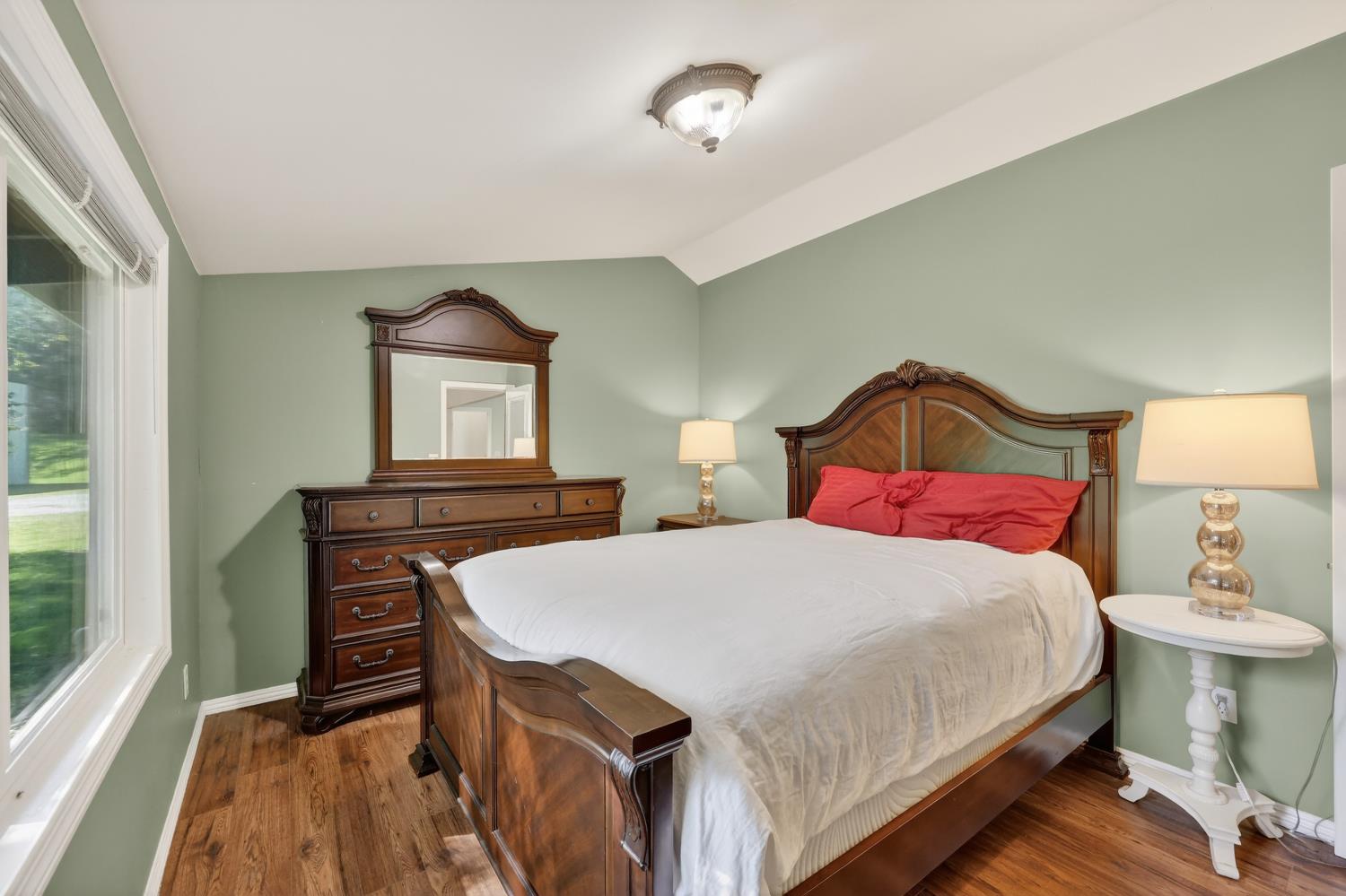 3000 Spring Hill Road Somerset, CA 95684 - Photo 60 of 94 a bedroom with a bed a dresser and window