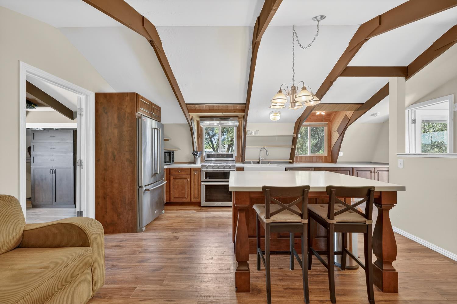 3000 Spring Hill Road Somerset, CA 95684 - Photo 65 of 94 a view of a dining room with furniture and wooden floor