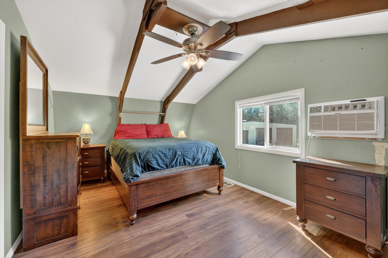 3000 Spring Hill Road Somerset, CA 95684 - Photo 68 of 94 a bedroom with a bed and wooden floor