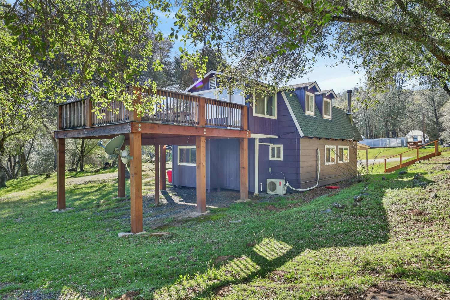 3000 Spring Hill Road Somerset, CA 95684 - Photo 74 of 94 a front view of a house with a yard