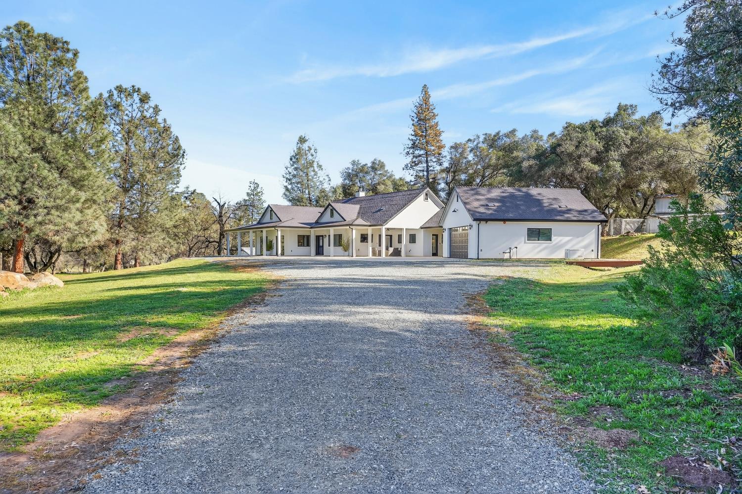 3000 Spring Hill Road Somerset, CA 95684 - Photo 92 of 94 a front view of a house with garden