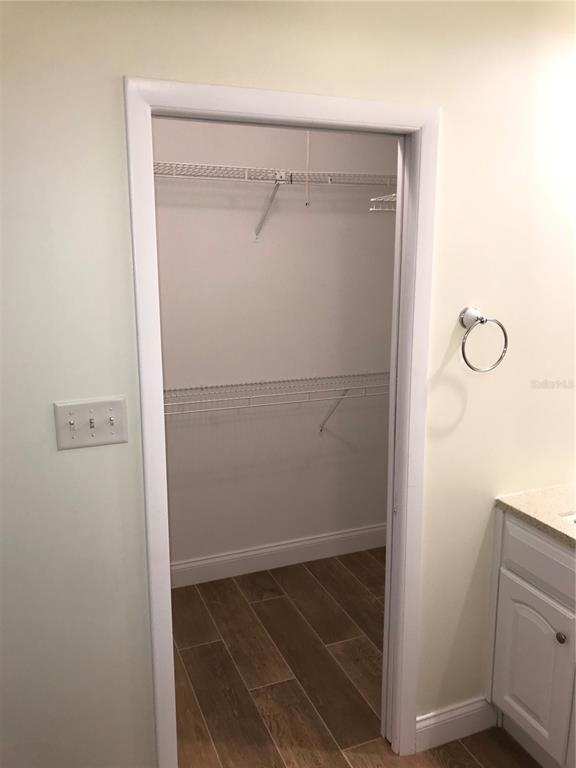 7806 17th Avenue Northwest Bradenton, FL 34209 - Photo 19 of 33 a bathroom with a glass shower door