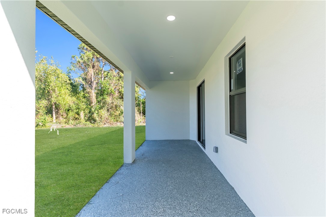 4306 2nd Street Southwest Lehigh Acres, FL 33976 - Photo 21 of 21 a view of a big room with an outdoor space