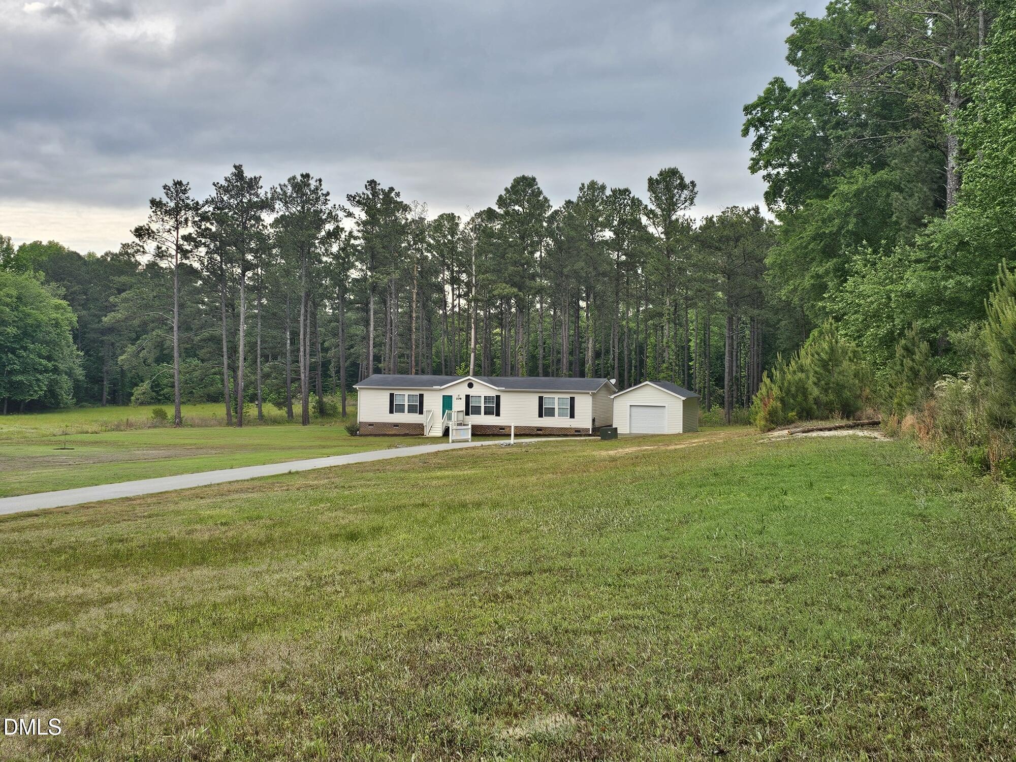 208 Loop Road Bunnlevel, NC 28323 - Photo 2 of 39 20260501_182854_resized