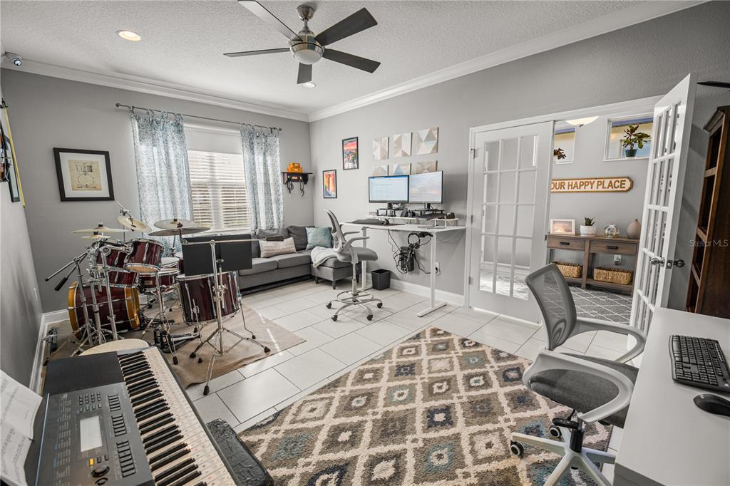 5196 Appenine Loop East St. Cloud, FL 34771 - Photo 15 of 39 a very nice looking living room with a large window and furniture