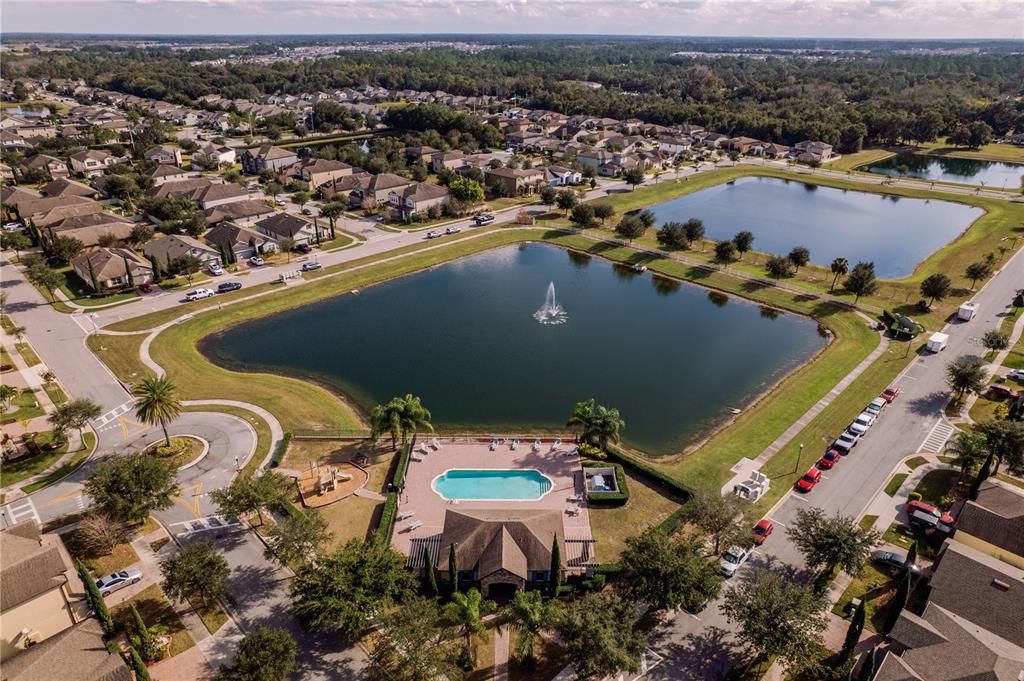 5196 Appenine Loop East St. Cloud, FL 34771 - Photo 36 of 39 an aerial view of a house with a swimming pool yard and outdoor seating