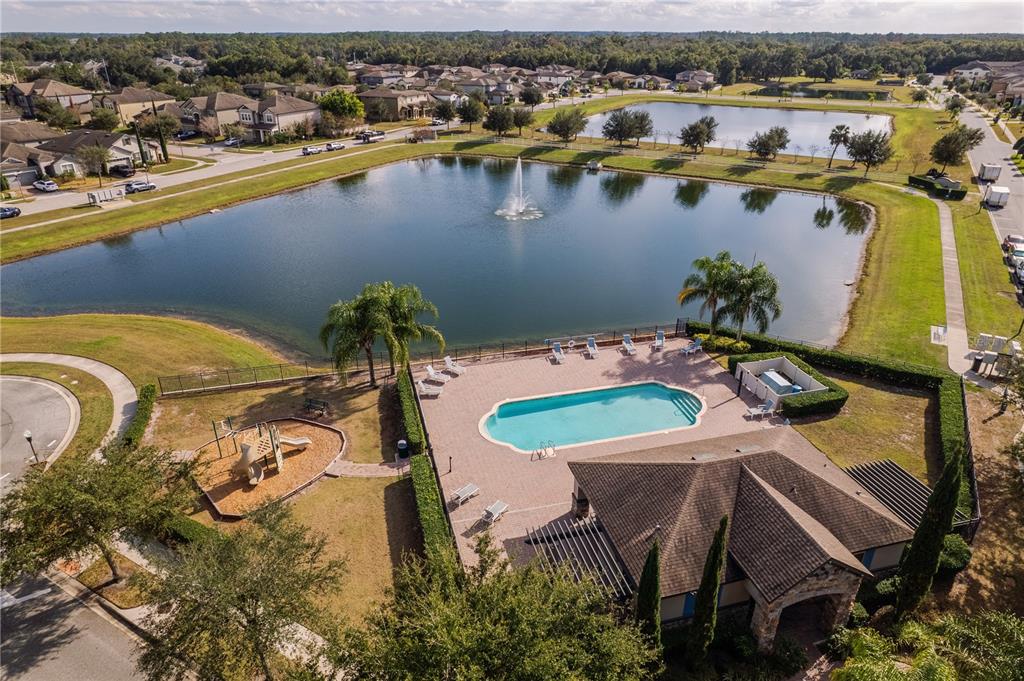 5196 Appenine Loop East St. Cloud, FL 34771 - Photo 37 of 39 an aerial view of a house with a lake view