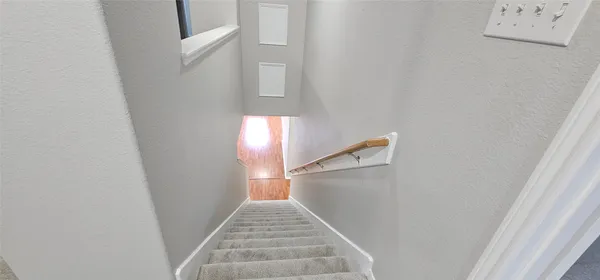 a view of hallway with sink
