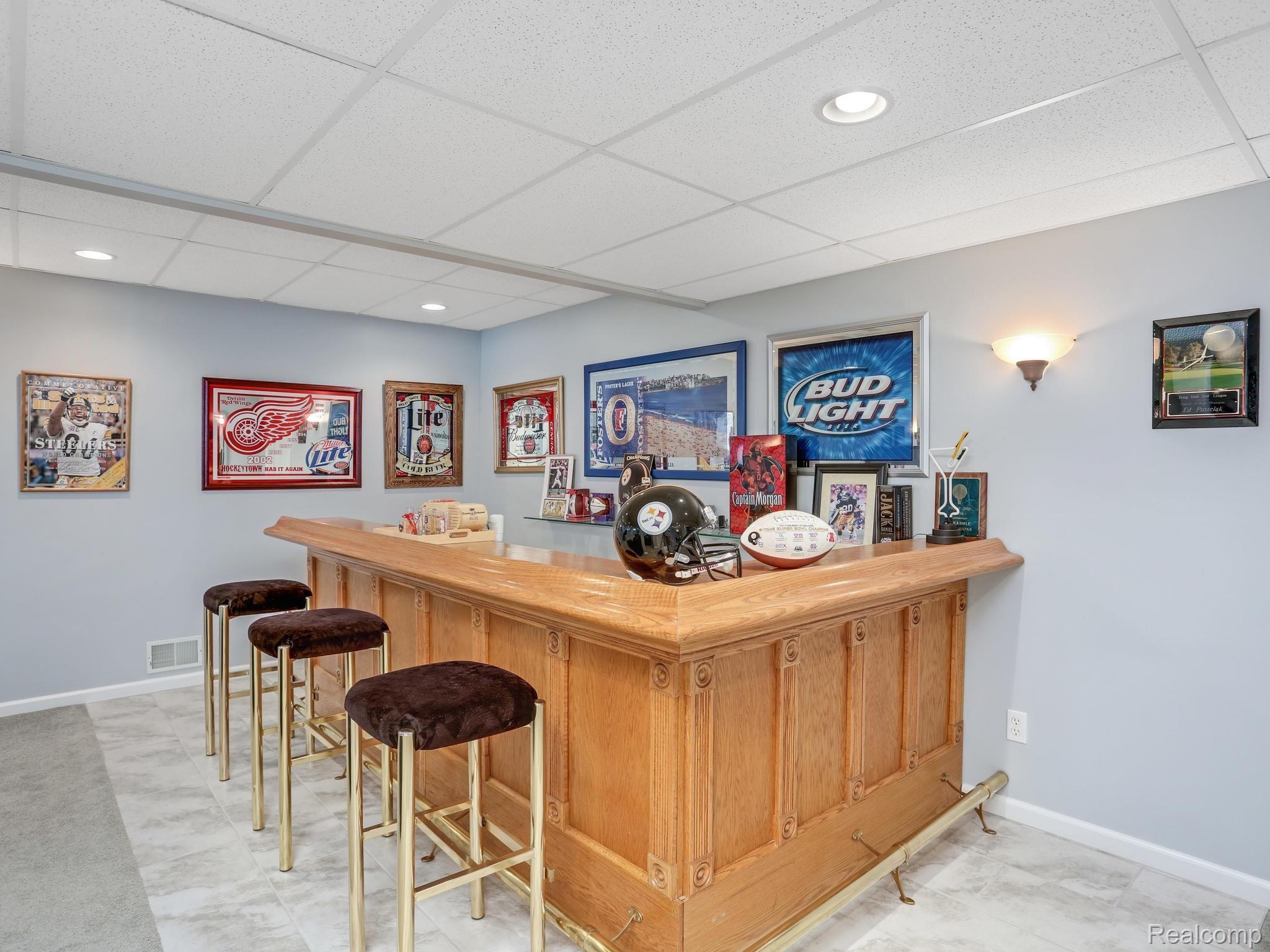 4546 Woodcliff Court Rochester, MI 48306 - Photo 37 of 43 Lower Level Bar
