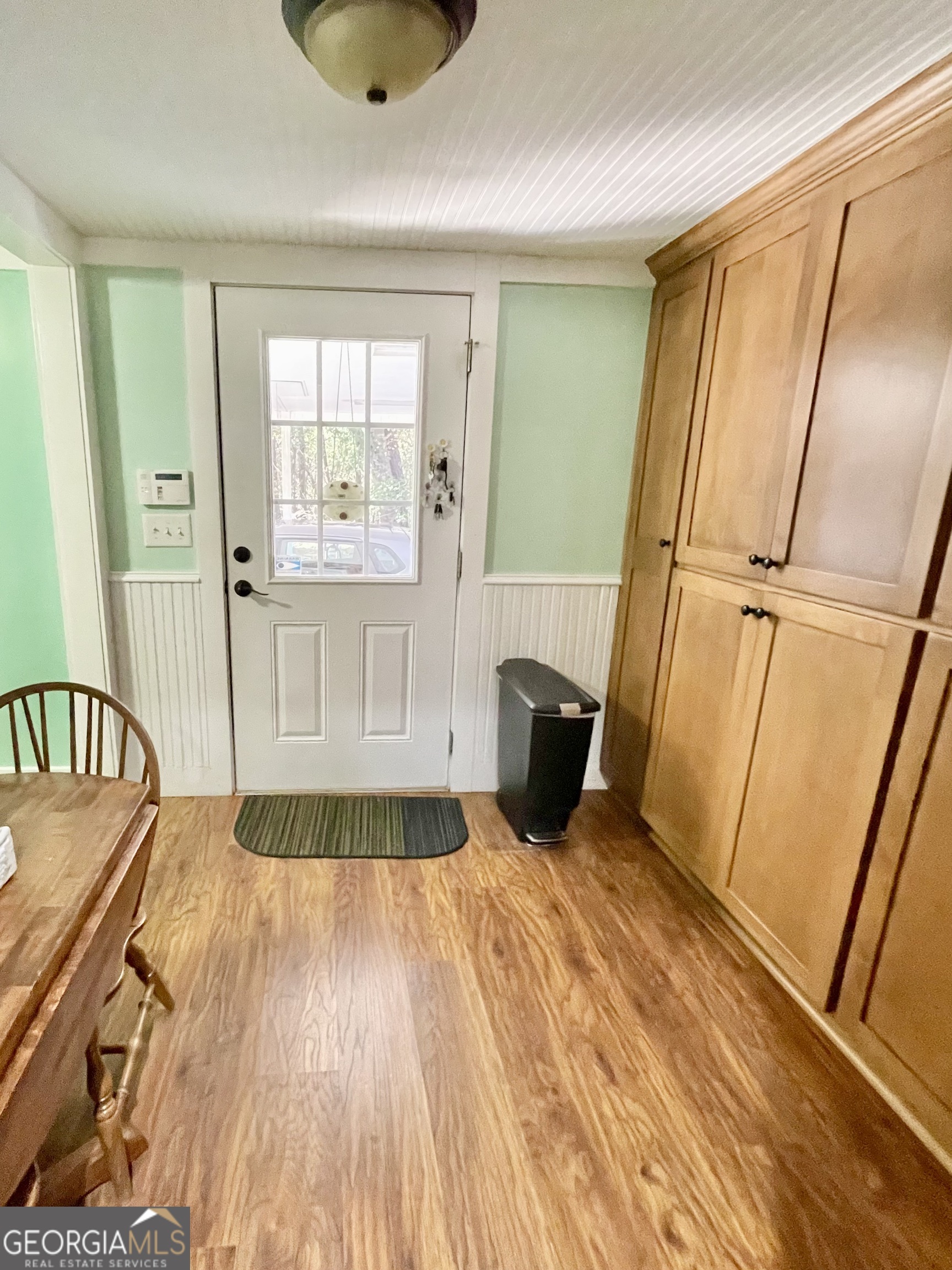 98 Waterfront Way Warner Robins, GA 31093 - Photo 12 of 28 a view of kitchen with furniture and wooden floor