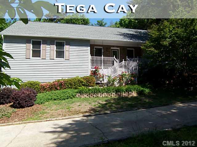 3096 Point Clear Drive Tega Cay, SC 29708 - Photo 1 of 16 a house view with a garden space