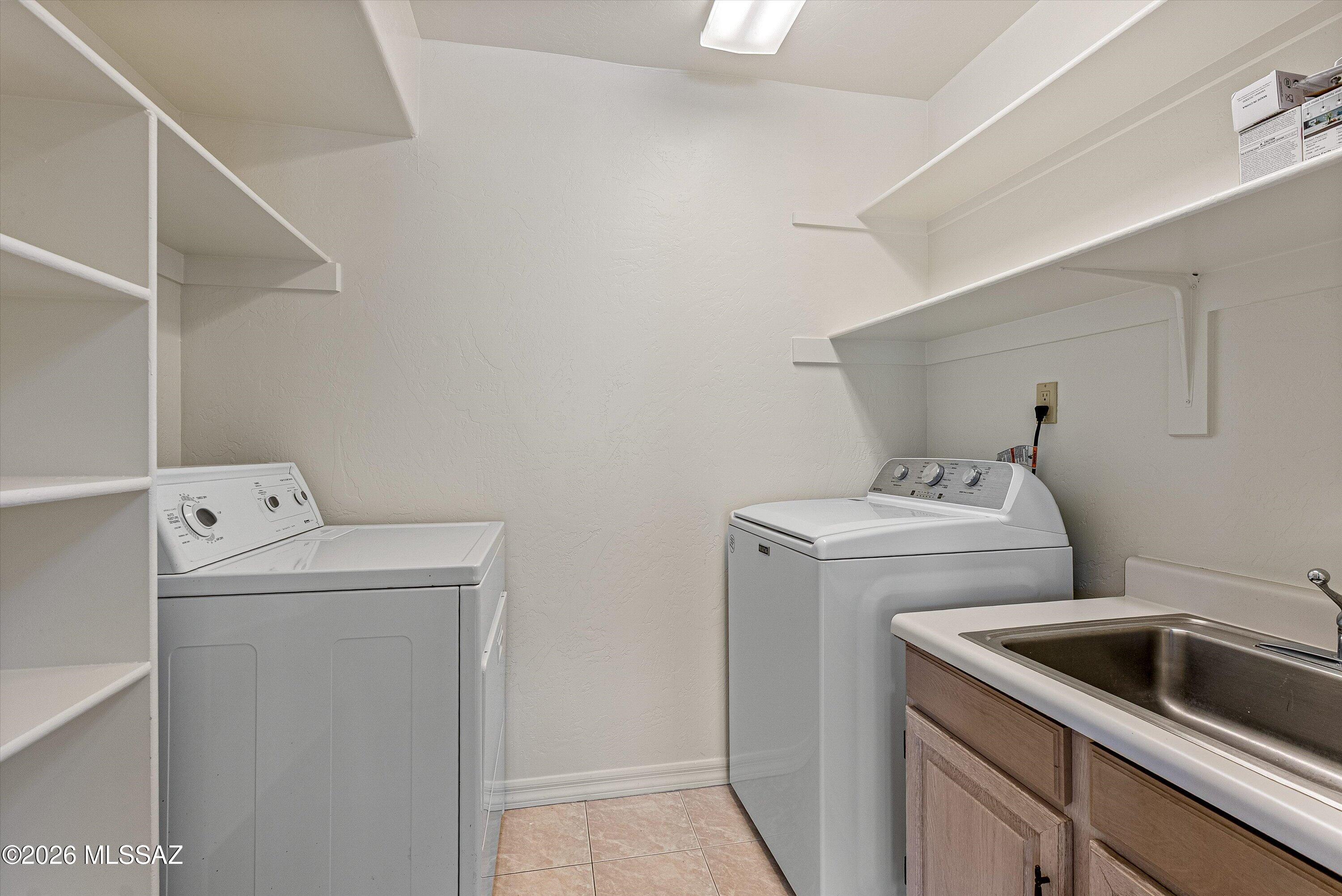 6340 North Valley View Road Tucson, AZ 85718 - Photo 20 of 44 Laundry Room off the Kitchen
