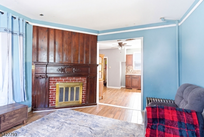 420 Mechanic Street Orange, NJ 07050 - Photo 3 of 18 a view of an entryway with fireplace