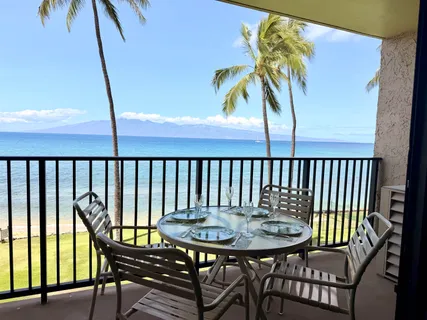 a view of a balcony with furniture