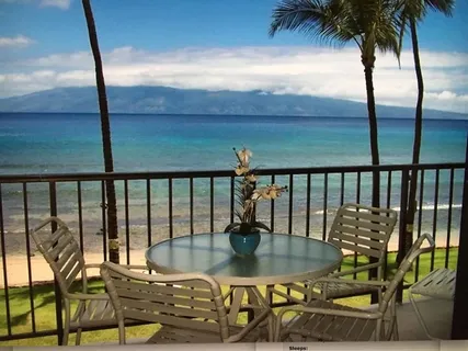 a view of swimming pool with outdoor seating