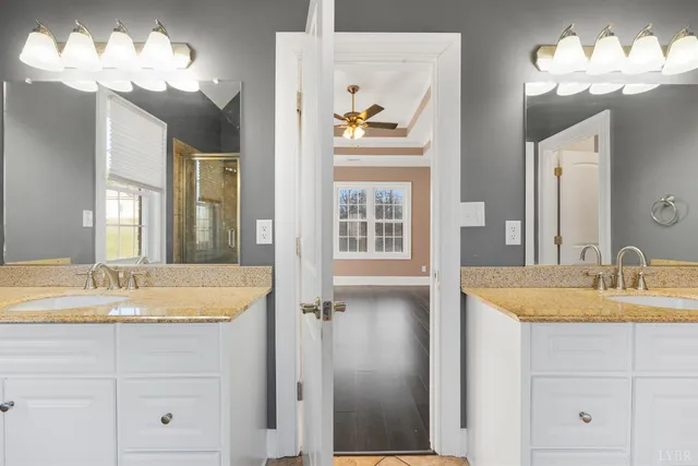 a white toilet and sink