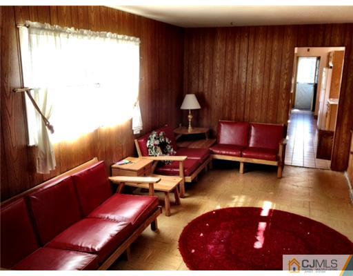 19 Highpoint Drive Edison, NJ 08820 - Photo 6 of 8 a living room with furniture and a pool table