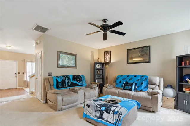 a living room with furniture and a couch