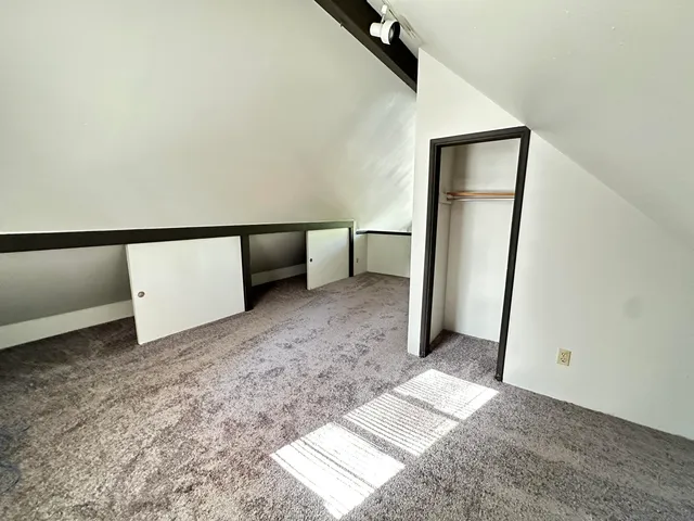 a view of outdoor space with wooden floor and fence