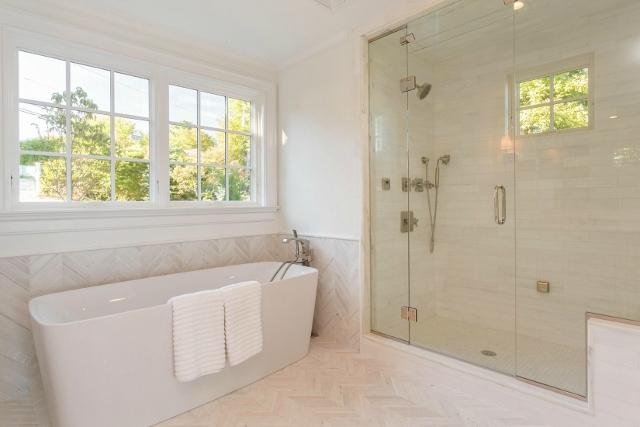 22 Point Road Norwalk, CT 06854 - Photo 13 of 24 a bathroom with a bathtub and shower