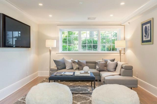 22 Point Road Norwalk, CT 06854 - Photo 14 of 24 a living room with furniture and a large window